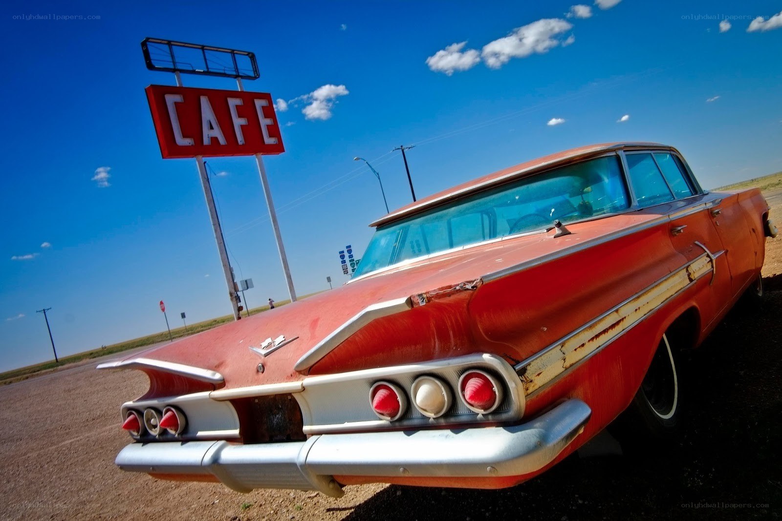 Retro car at roadside cafe