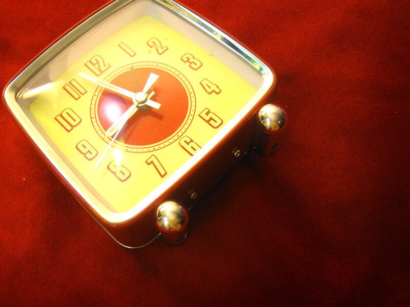Retro square clock on red