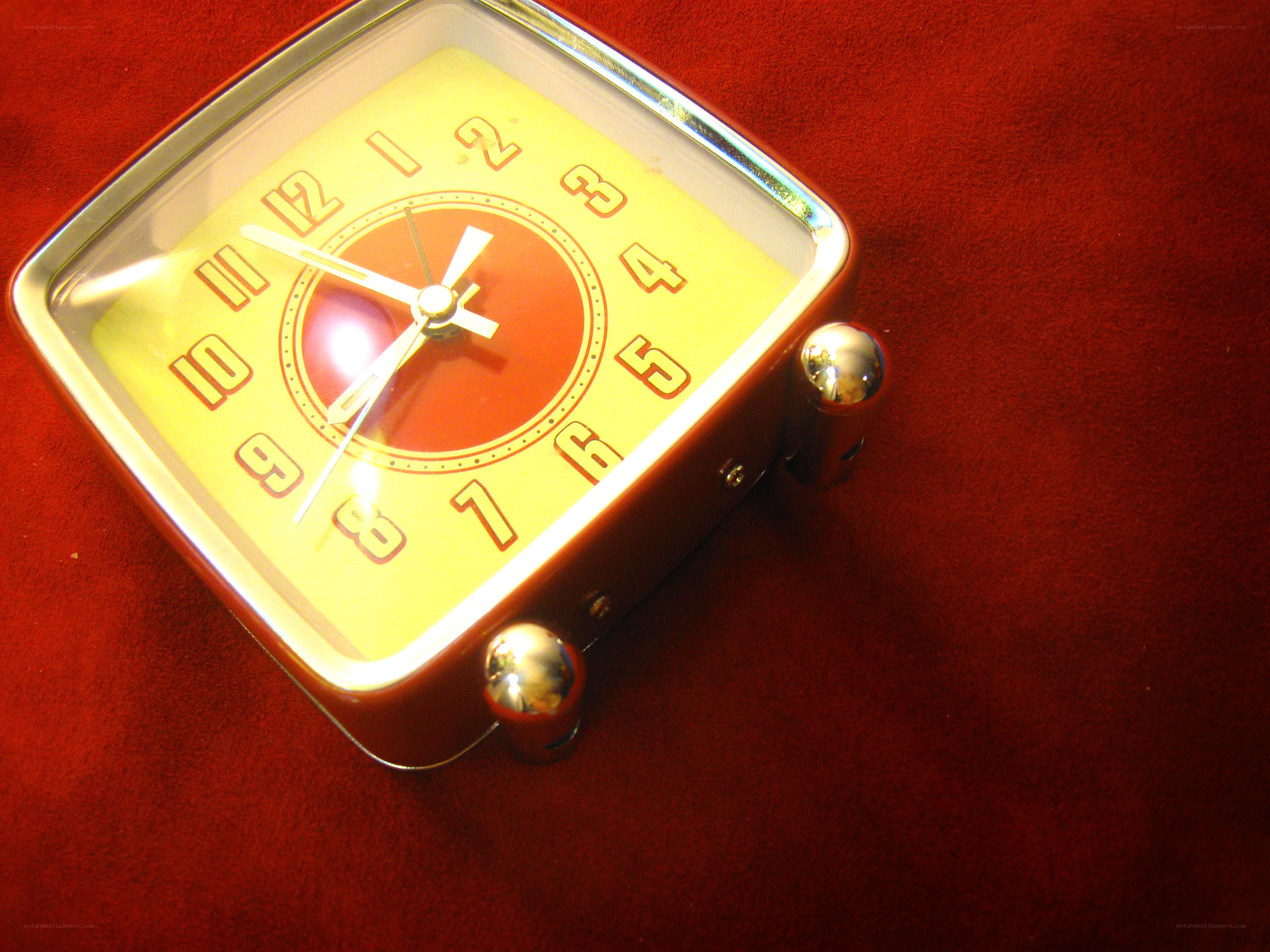 Retro square clock on red