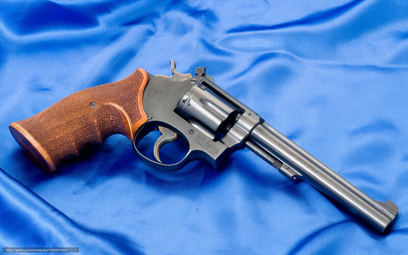 revolver on blue cloth
