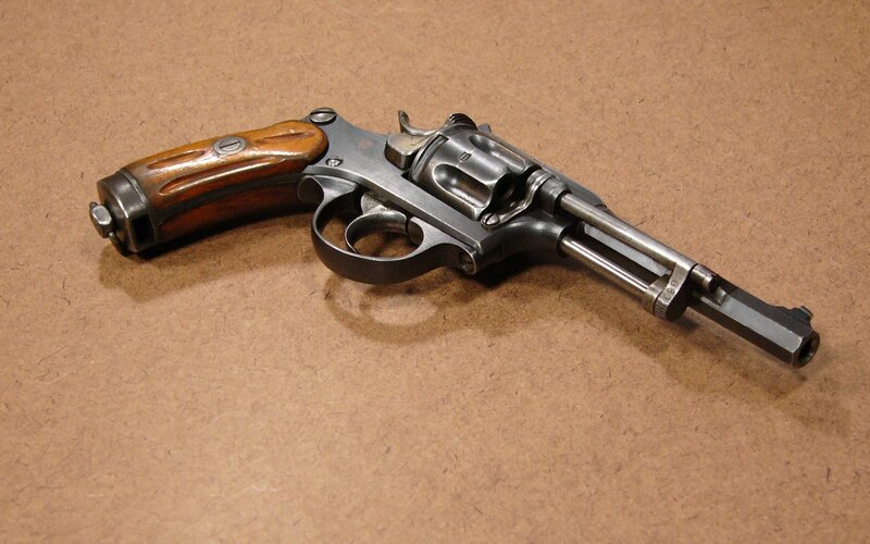 Revolver on Brown Surface — Neutral