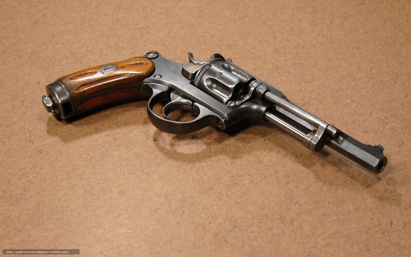 revolver on brown surface