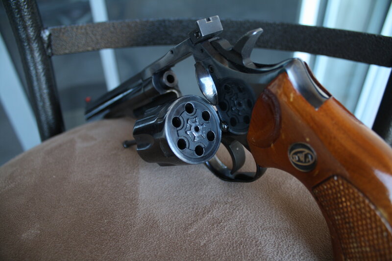 revolver on chair seat
