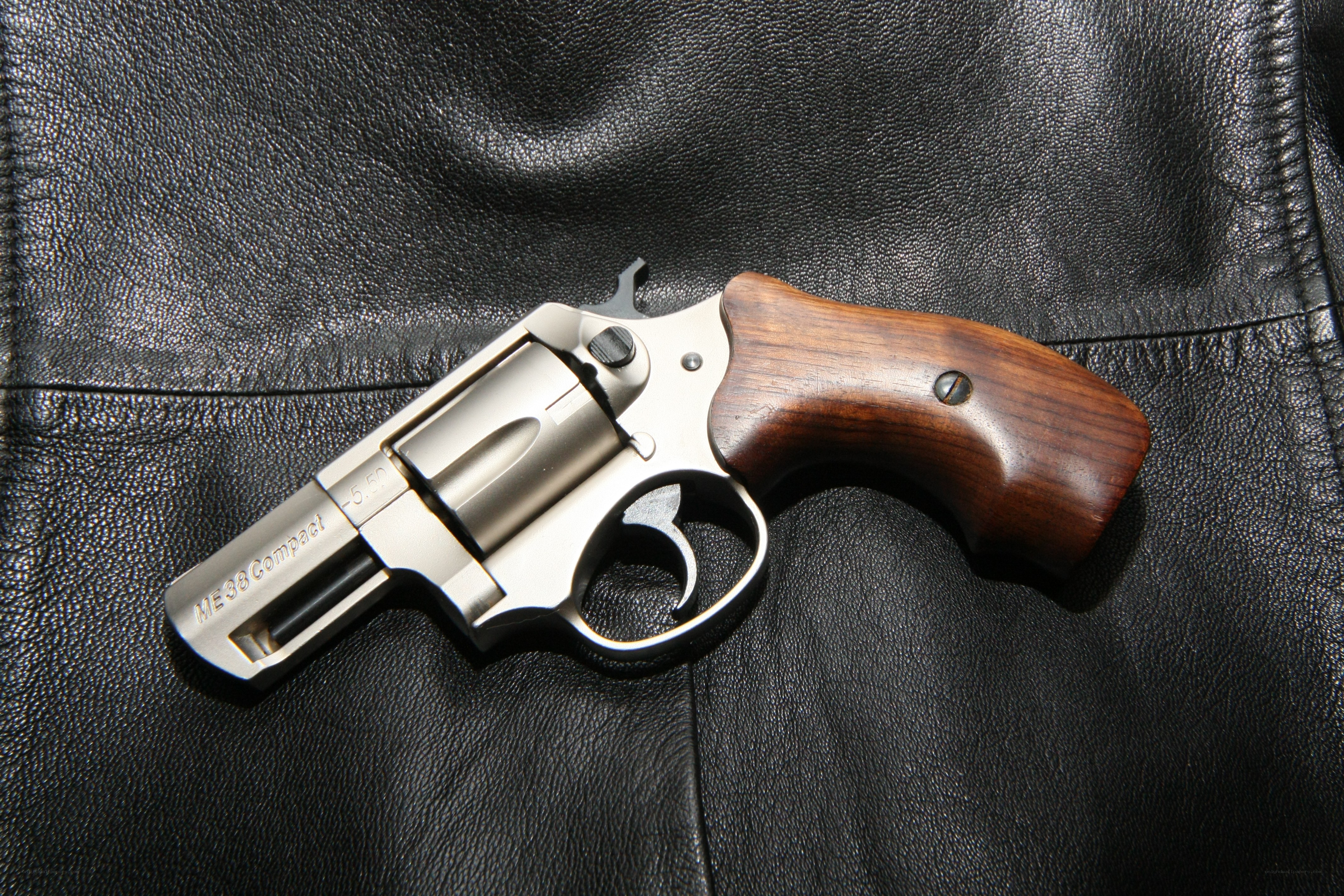 revolver on leather surface