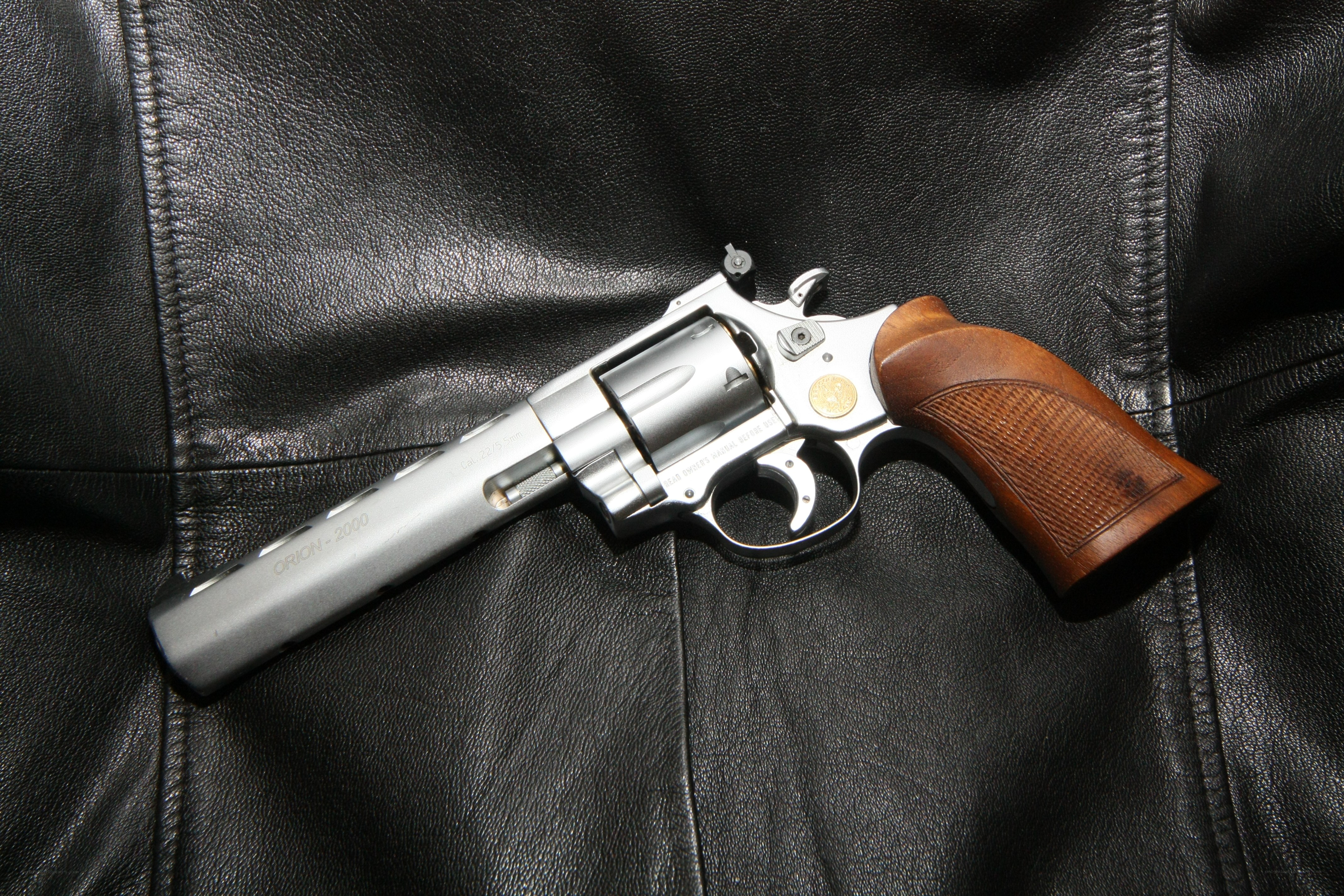 revolver on leather surface