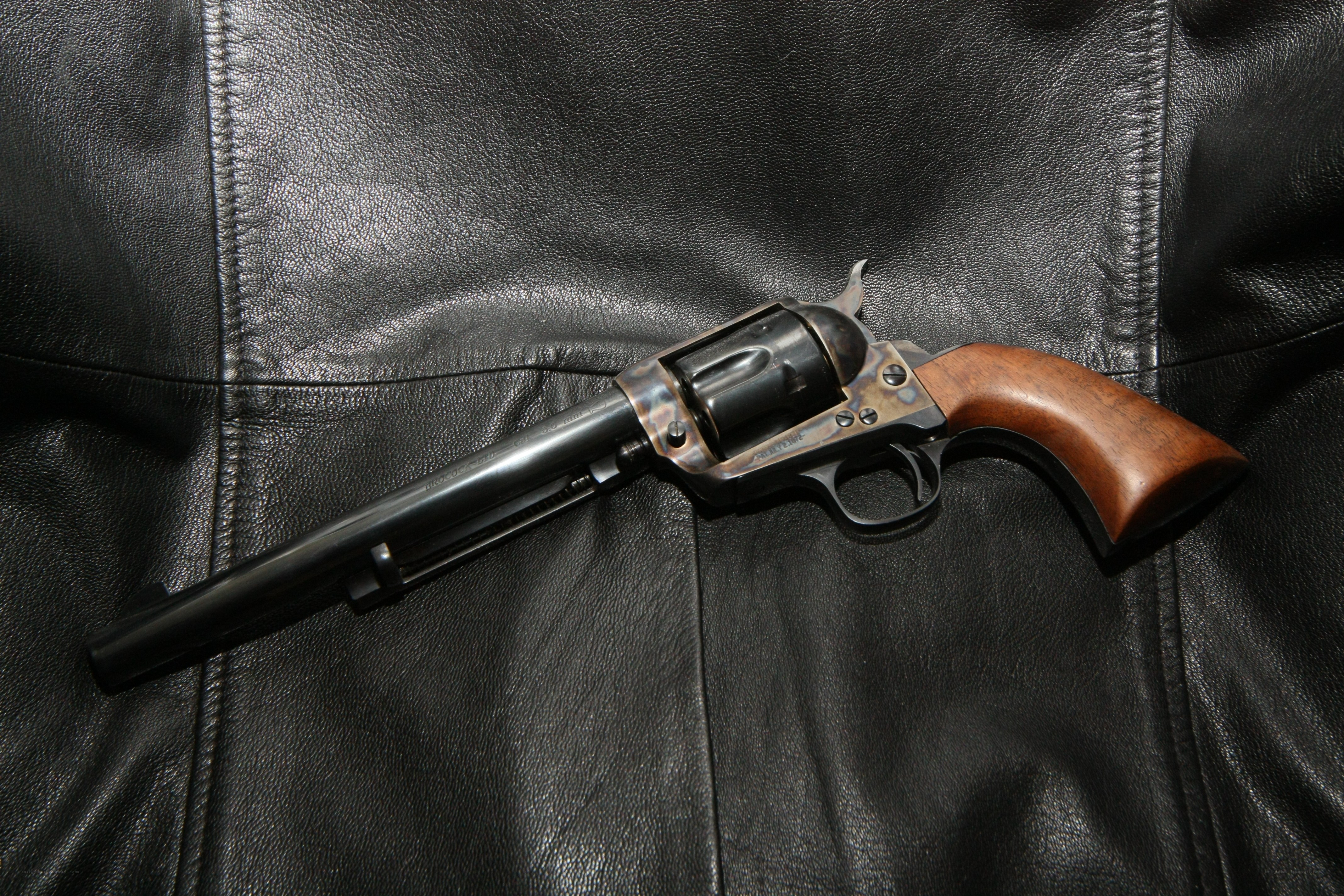 revolver on leather surface