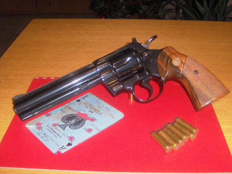 Revolver on Red Paper