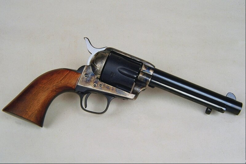 revolver on white surface