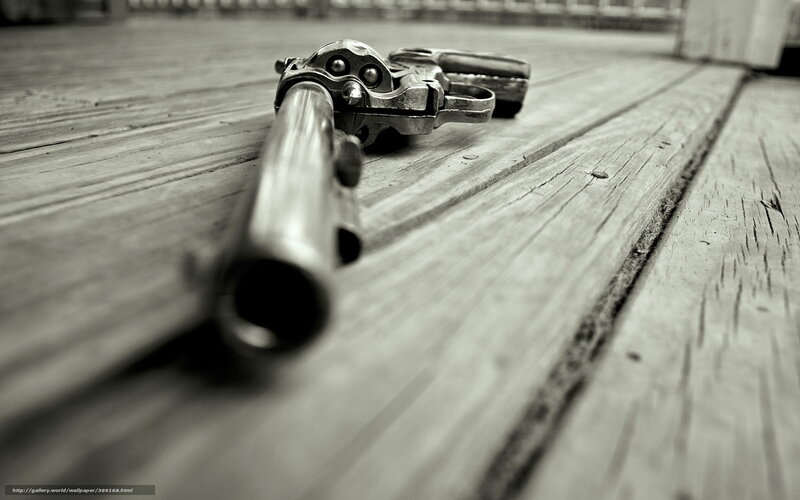 Revolver on wooden deck