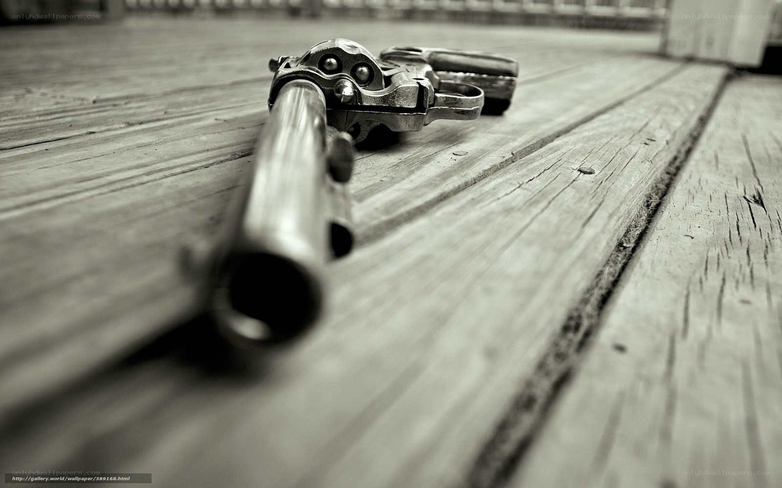 Revolver on wooden deck