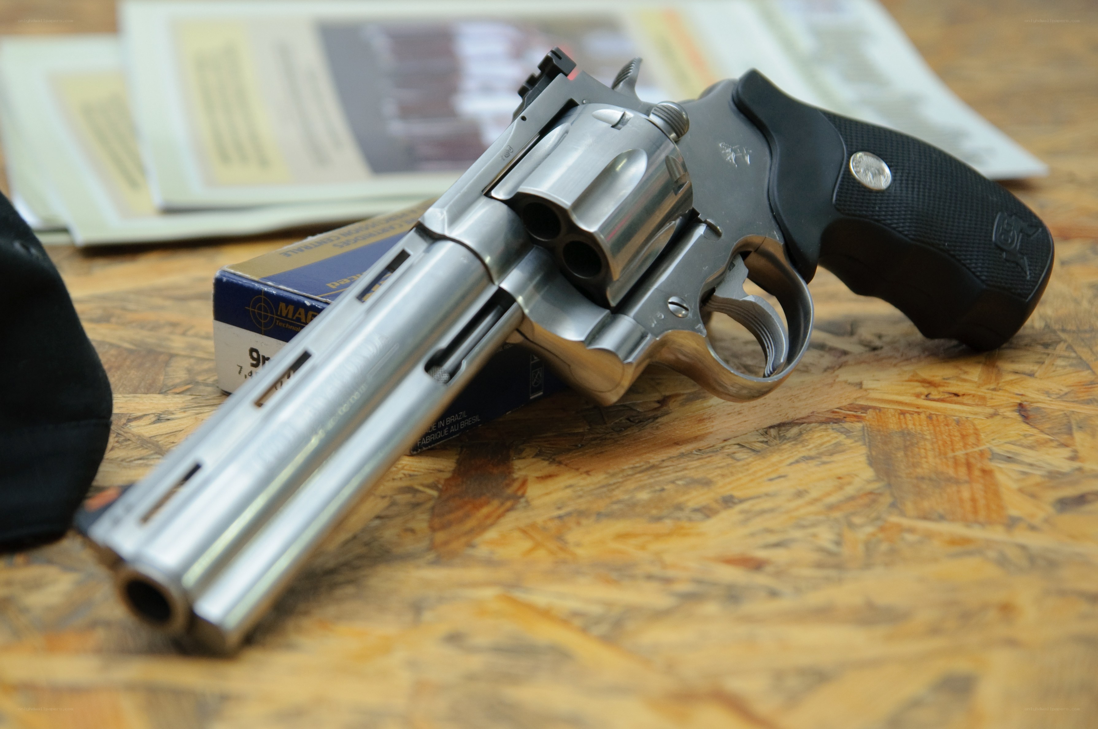 revolver on wooden surface