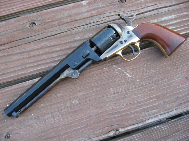 revolver on wooden surface