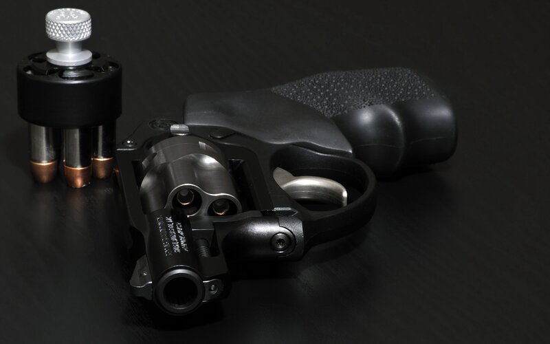 Revolver with Ammunition — Black, Dramatic, Photograph