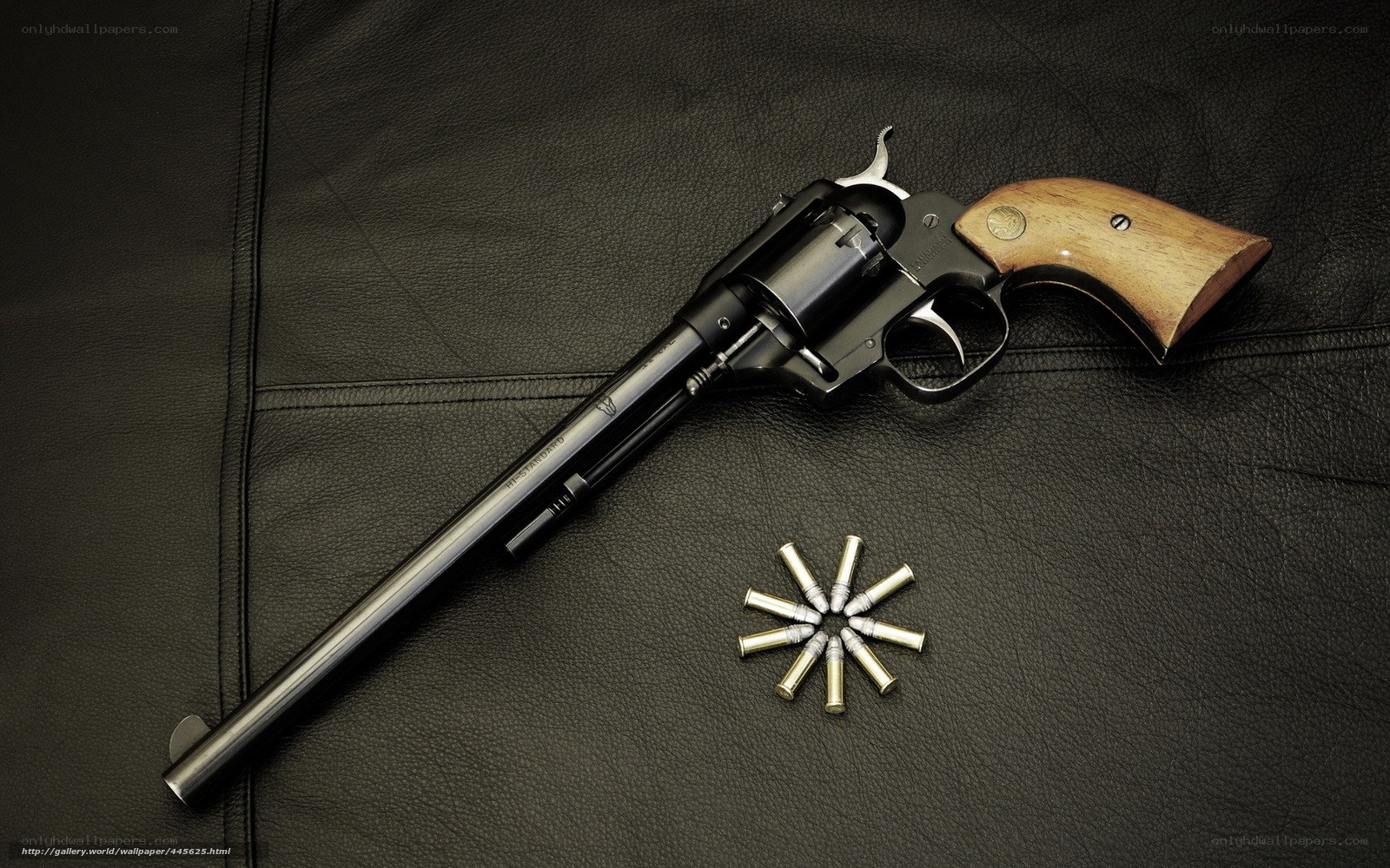 revolver with bullets on leather