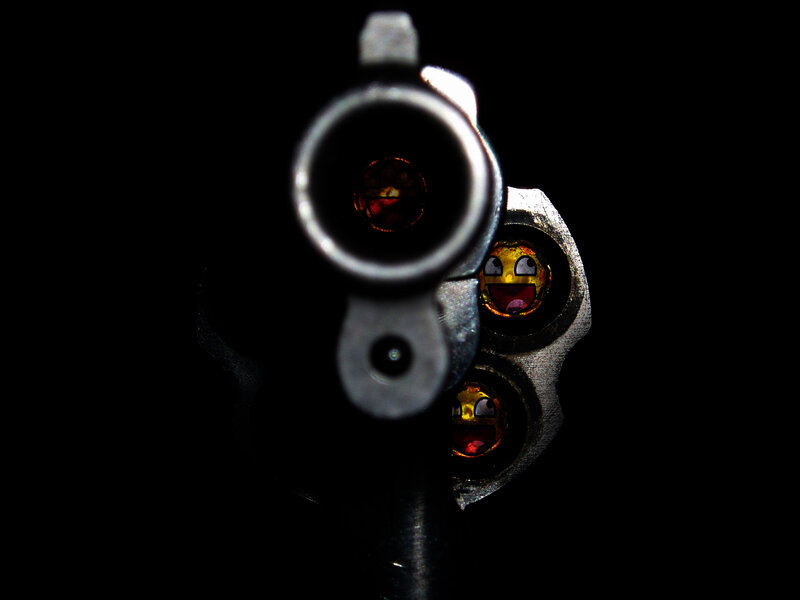 revolver with emoji faces