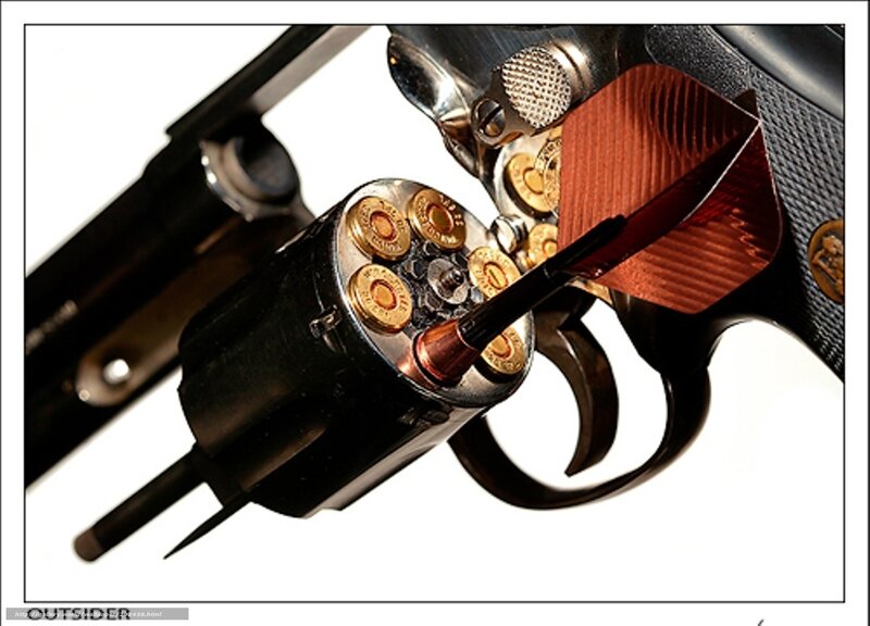 revolver with exposed cylinder