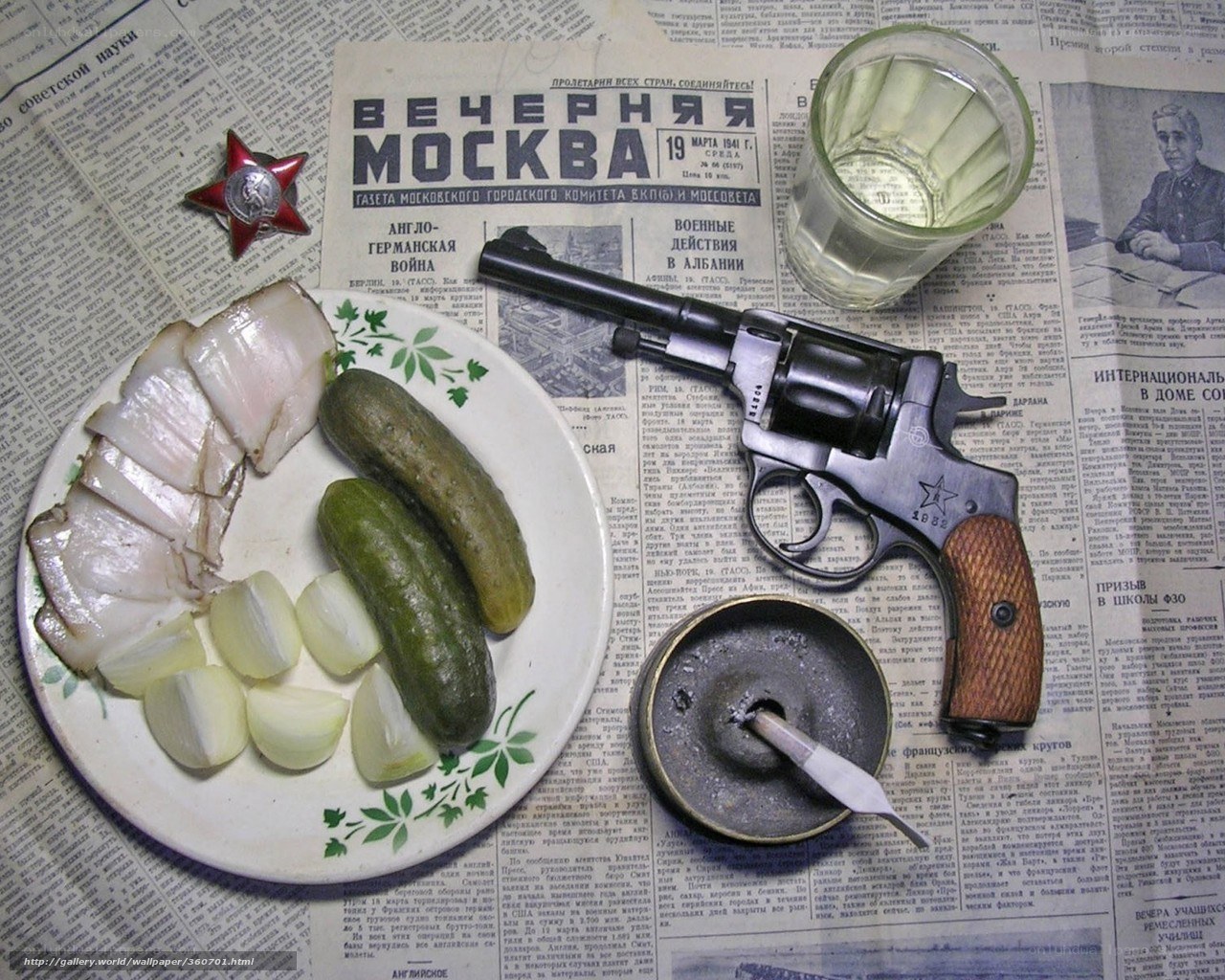 Revolver with food on newspaper