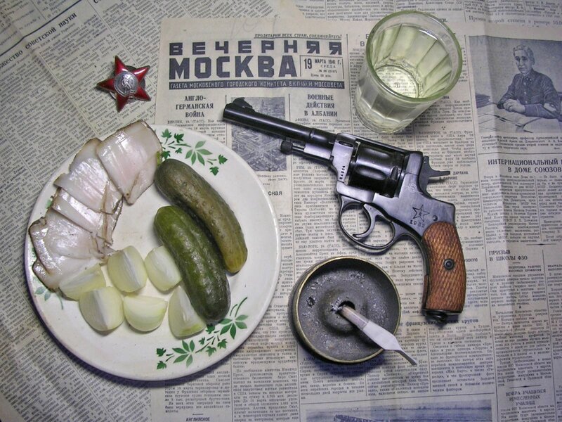 Revolver with food on newspaper