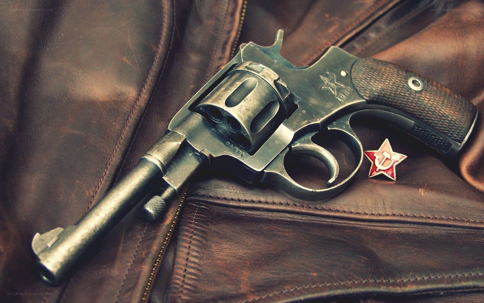 Revolver with Soviet insignia