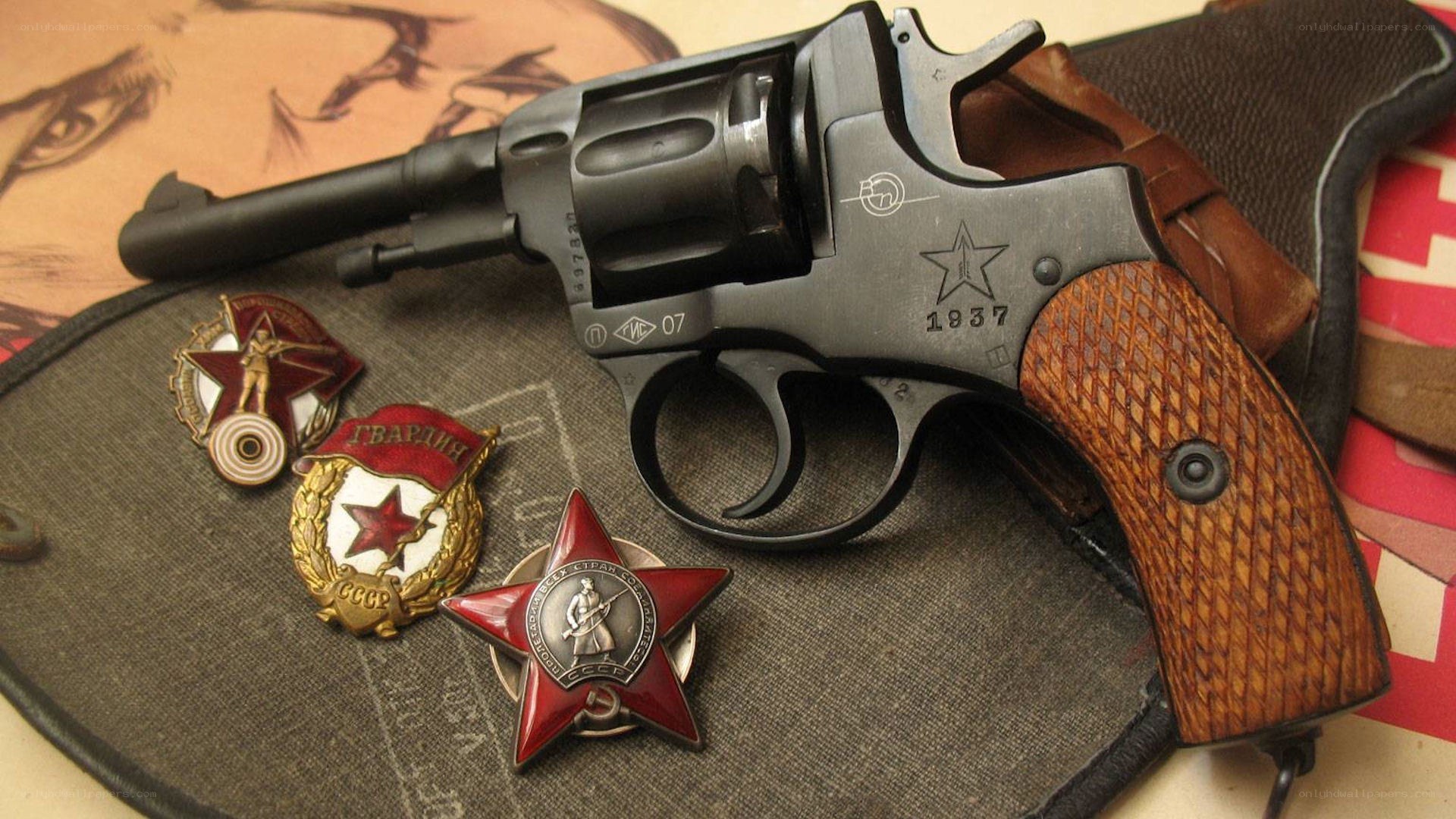 Revolver with Soviet medals