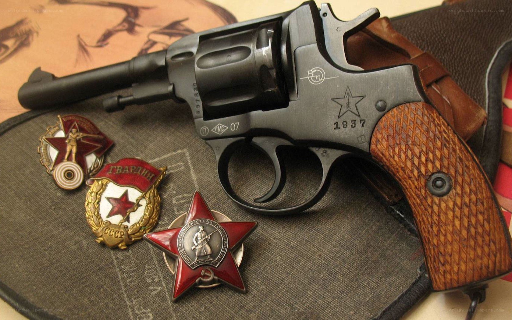 Revolver with Soviet medals