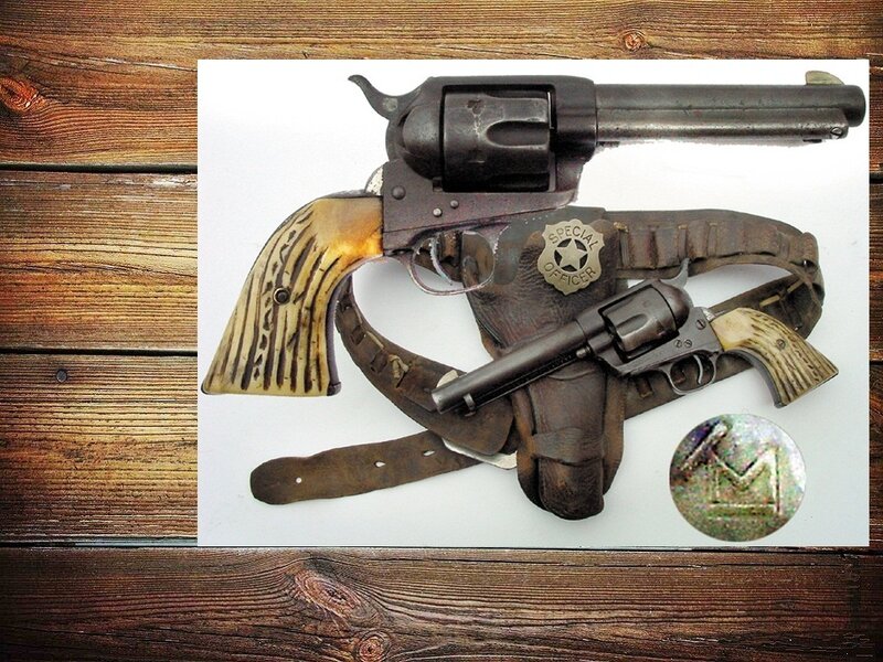 revolvers and sheriff badge