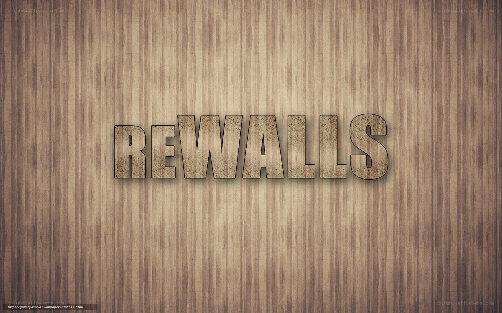 Rewalls text on wood background