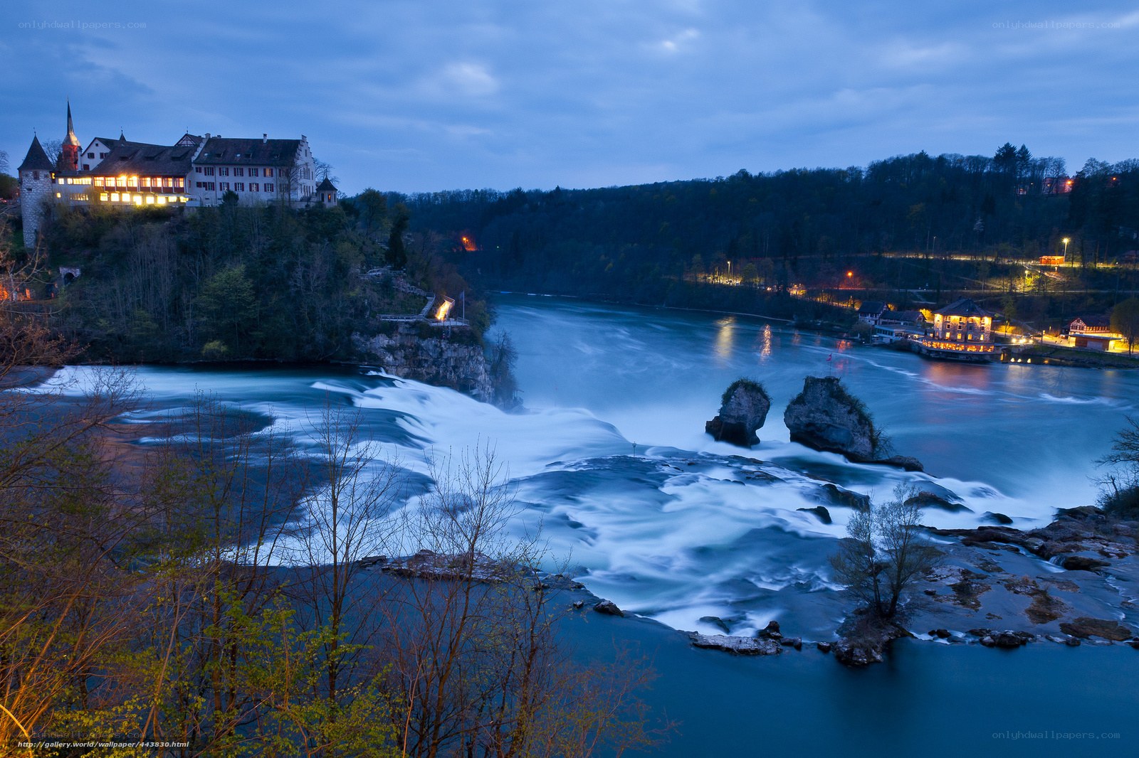 Rhine Falls at dusk with castle