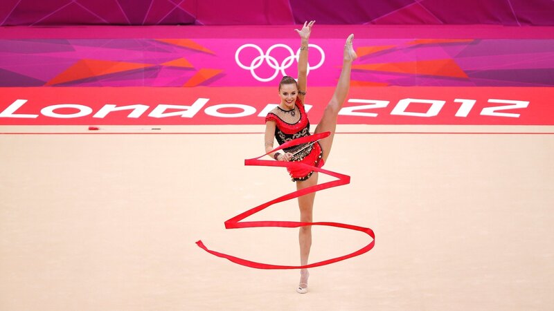 Rhythmic gymnast performing with ribbon