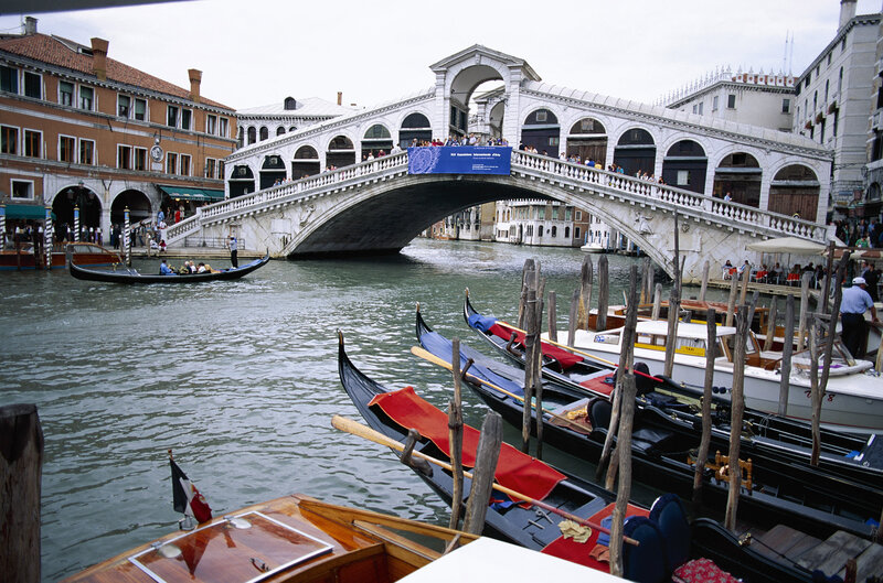 Rialto Bridge and gondolas in Venice
