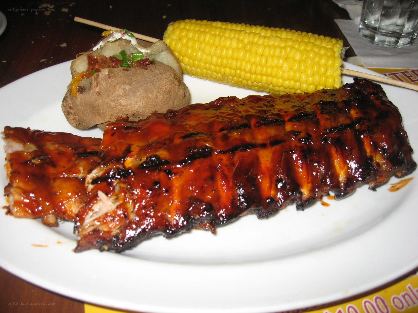 ribs with corn and baked potato