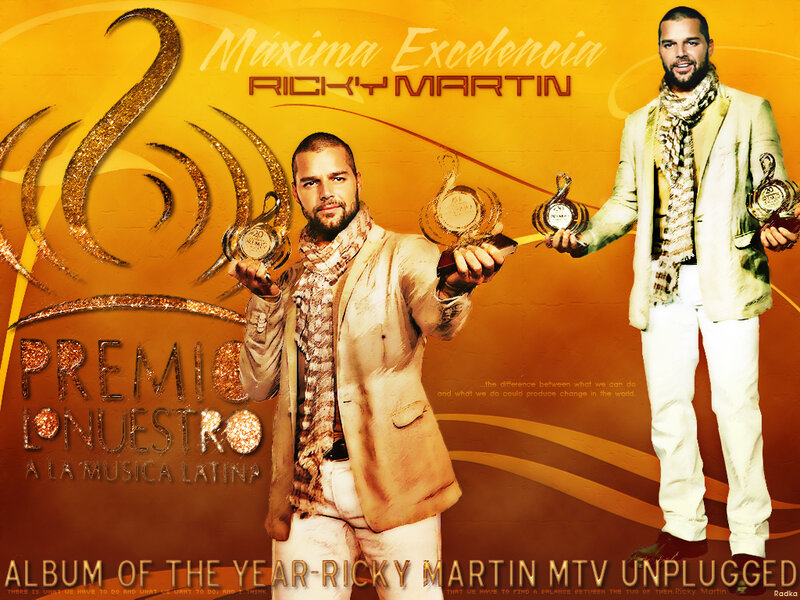 Ricky Martin Holding Awards