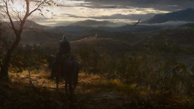 Rider on a hill overlooking a valley
