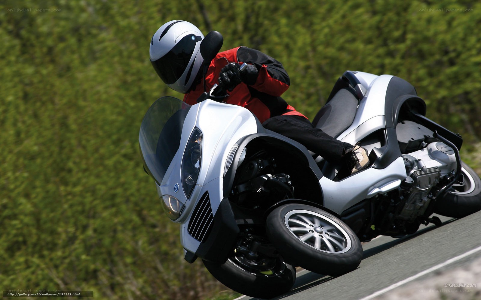 rider on a three-wheeled motorcycle