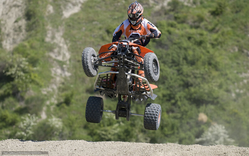 Rider on ATV Mid-air — Orange