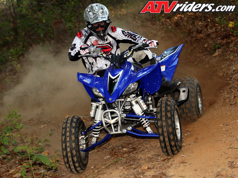 Rider on Blue ATV — Action
