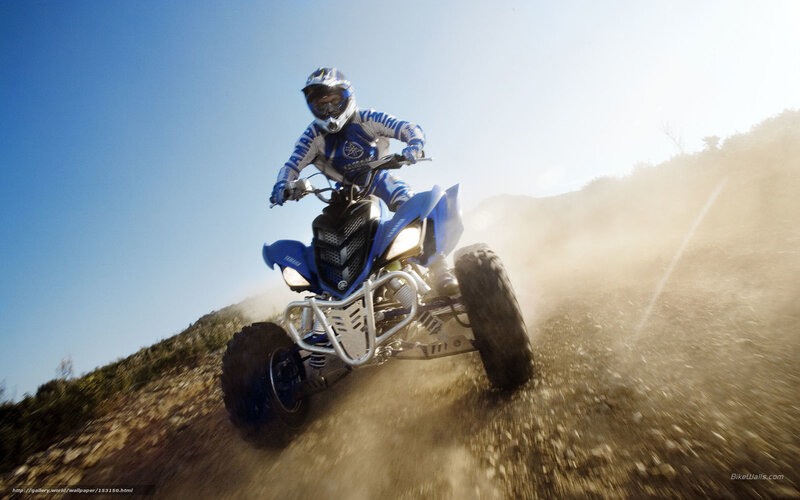Rider on Blue ATV — Dynamic, Afternoon, Photograph