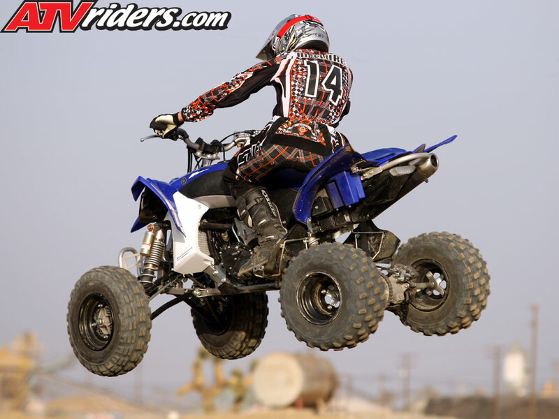Rider on Blue ATV — Dynamic, Afternoon