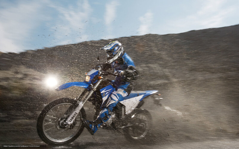 rider on blue dirt bike
