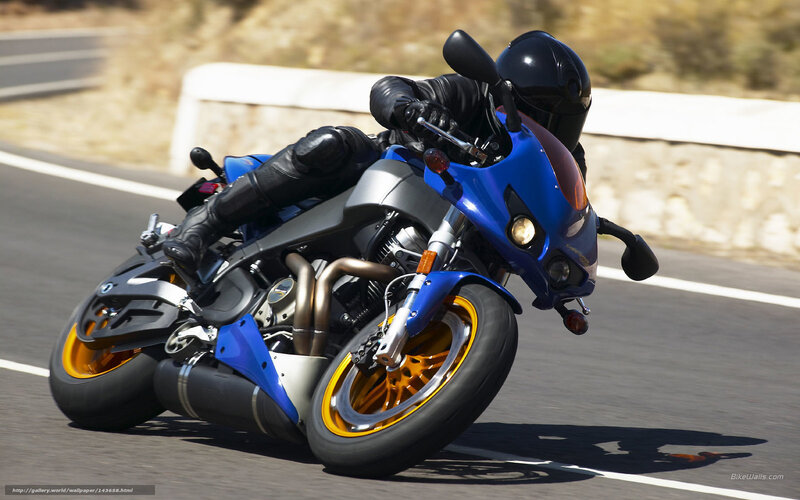 rider on blue motorcycle