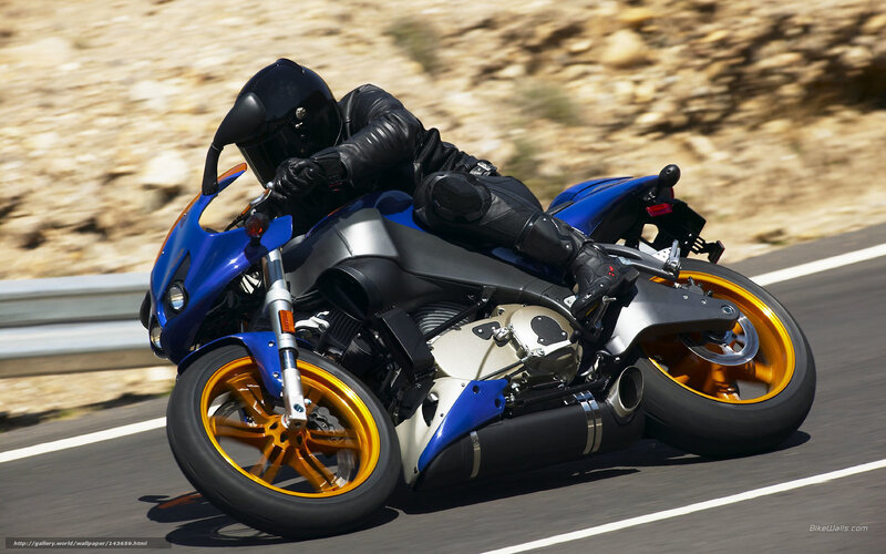 rider on blue motorcycle