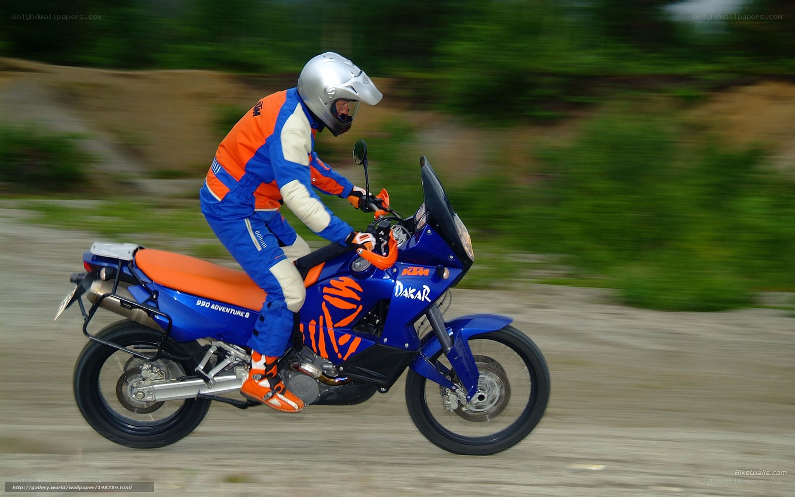 rider on blue motorcycle
