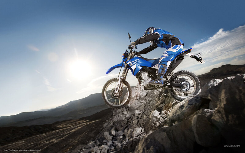 Rider on Blue Motorcycle — Dramatic