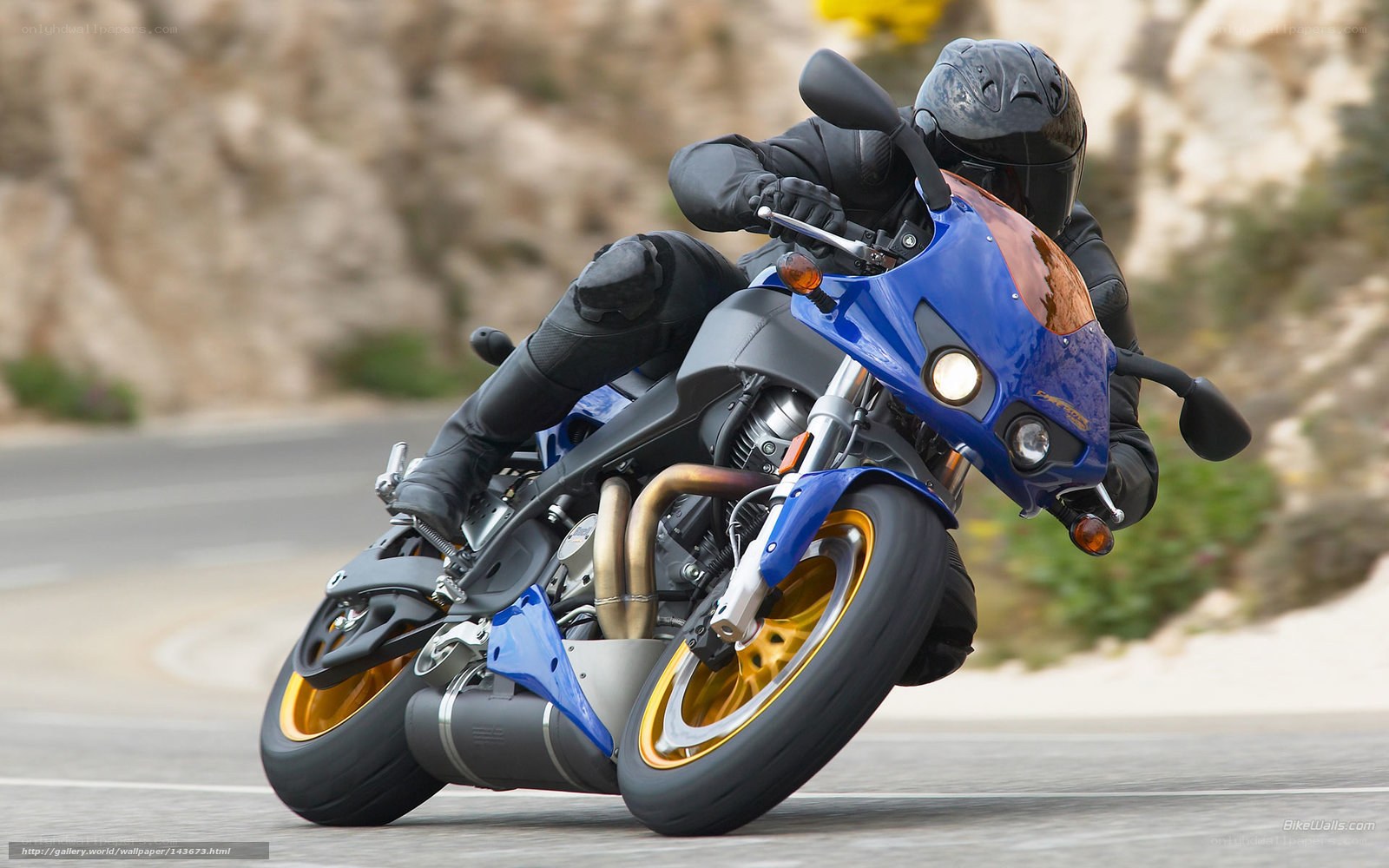 rider on blue sportbike