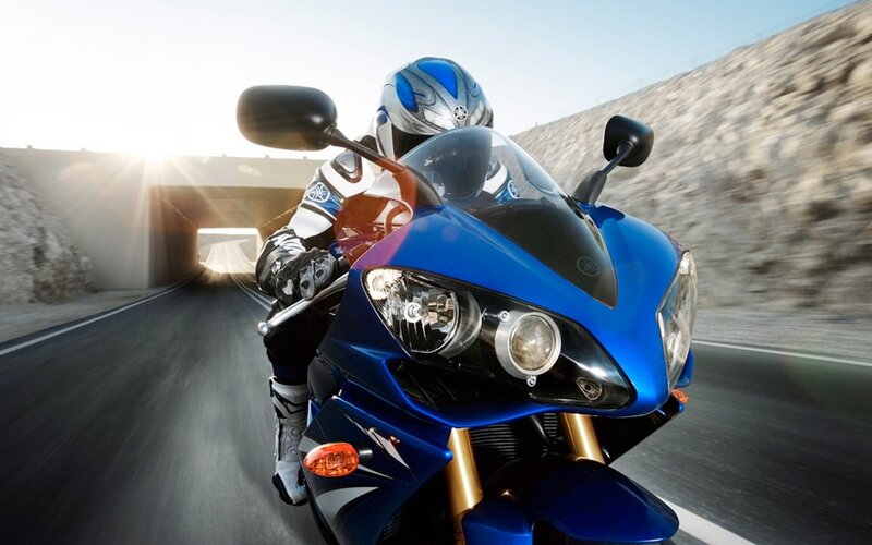 rider on blue sportbike