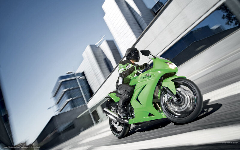 Rider on Green Motorcycle — Dynamic, Afternoon, Photograph
