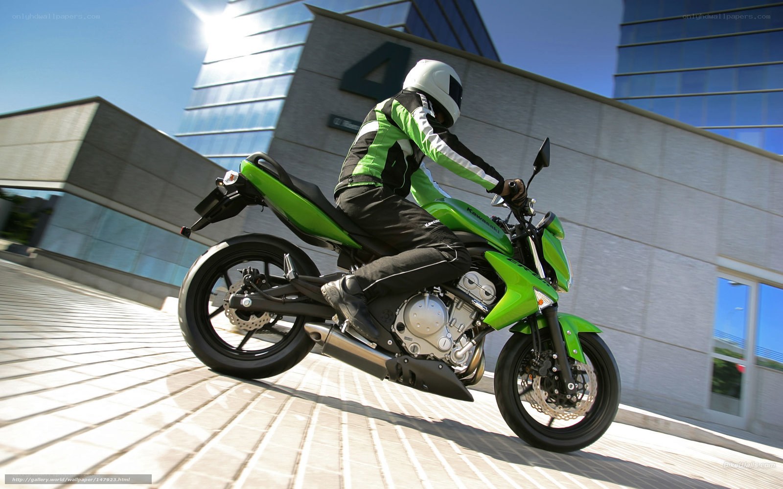 Rider on green motorcycle