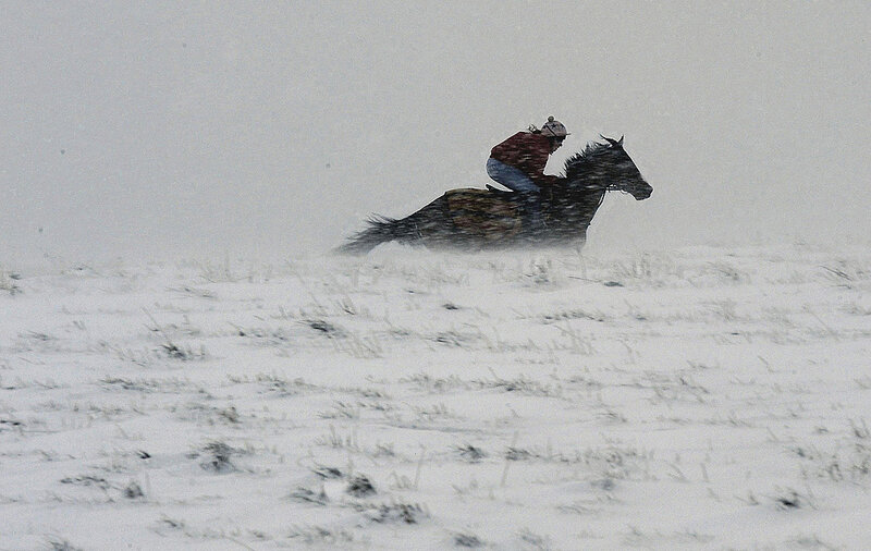 Rider on Horse in Snow