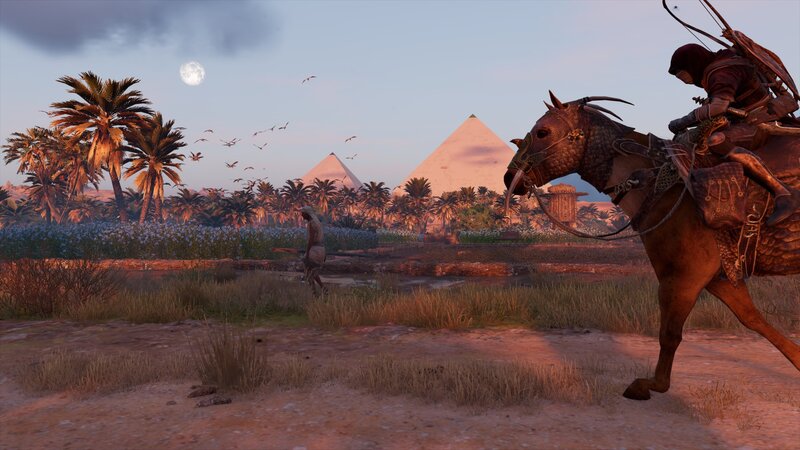 Rider on Horse Near Pyramids
