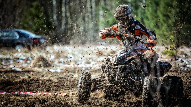 Rider on Muddy ATV — Brown, Dynamic